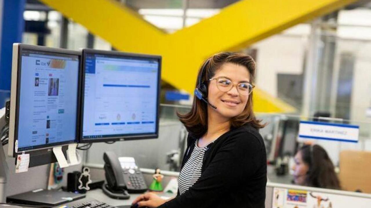 UCPath employee at her desk