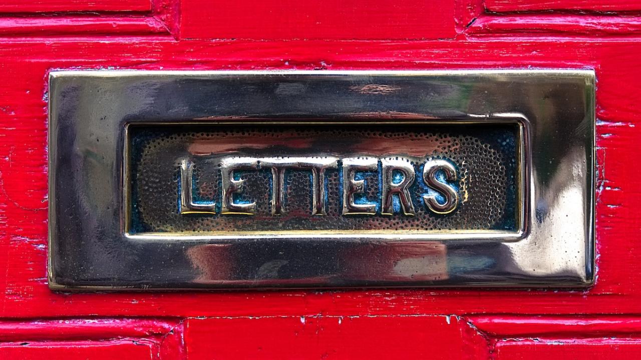 letters slot in exterior buildign for mail